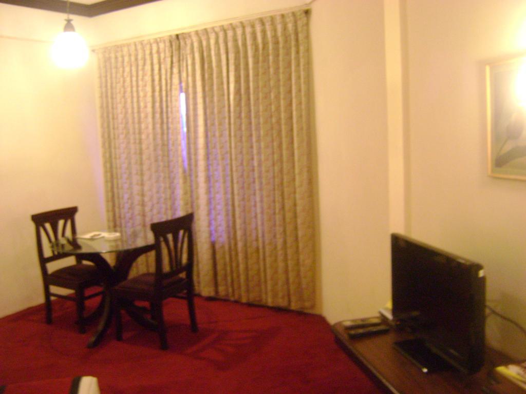 Manuelsons Malabar Palace Kozhikode Zewnętrze zdjęcie